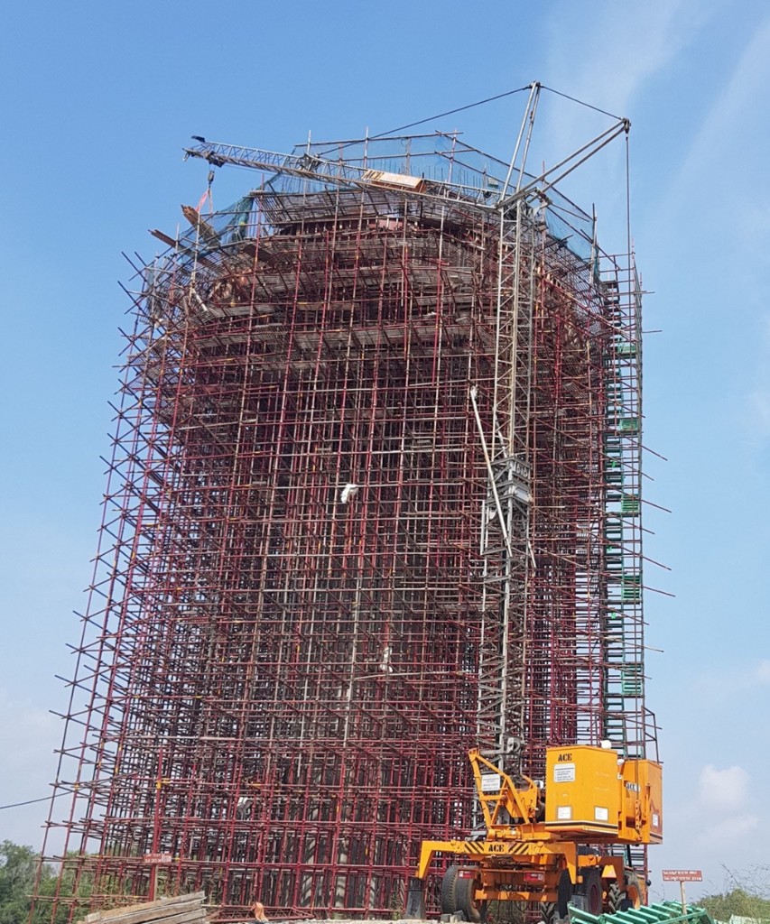 IGCAR elevated water tank under scaffolding with crane at Kalpakkam